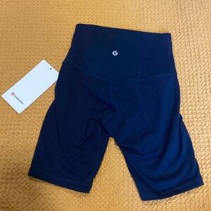 Navy Blue NEVER WORN LULULEMON Biker shorts. WITH TAG